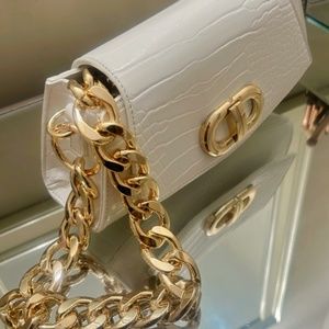 White & gold leather purse